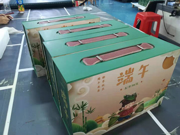 El diseño de paquete más nuevo para el set de regalo del Festival del Bote del Dragón